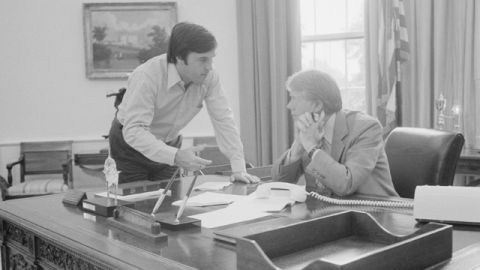Hamilton Jordan consults with Jimmy Carter in the Oval Office, August 24, 1977.