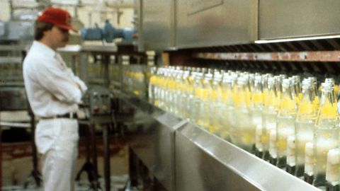 Worker in bottle factory, 2000