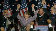 House Democratic Leader Rep. Nancy Pelosi celebrates with fellow Democrats at an election-night rally in Washington. November 2006. (AP Photo/J. Scott Applewhite, File)