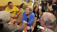 Harvard Law professor and consumer advocate, Democrat Elizabeth Warren talks with supporters at the J & M Diner in Framingham, Mass. September 2011. (AP Photo/Josh Reynolds)
