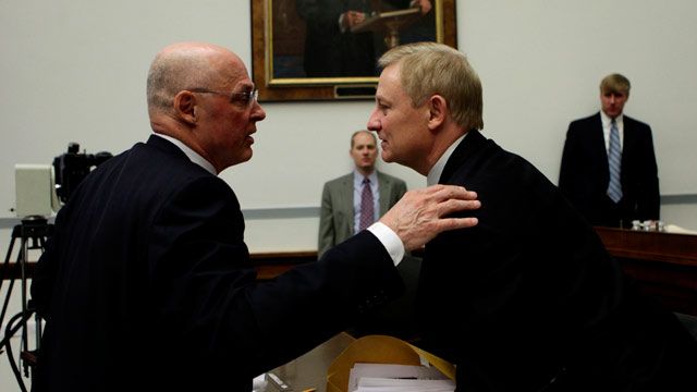 Former Treasury Sec. Henry Paulson talks with Rep. Spencer Bachus after testifying before the House Oversight and Government Reform Committee hearing on AIG. (AP Photo/Pablo Martinez Monsivais)