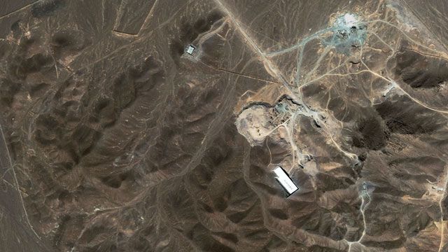 A satellite image shows a suspected nuclear enrichment facility under construction inside a mountain located north of Qom, Iran. September 2009. (AP/DigitalGlobe)