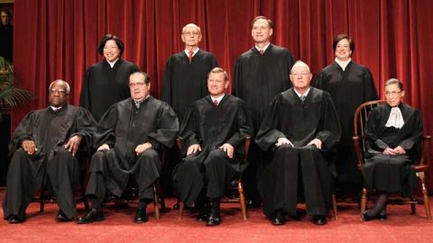 Members of the Supreme Court gather for a group portrait at the Supreme Court in Washington before the start of the 2010 session. October 2010. (AP Photo/Pablo Martinez Monsivais, File)