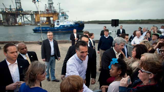 Republican presidential candidate Mitt Romney shakes hands during a campaign stop at the Port of Pascagoula, Miss. March 2012. (AP Photo/Evan Vucci)