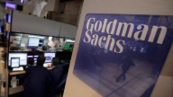 Traders work in the Goldman Sachs booth on the floor of the New York Stock Exchange. March 2012. (AP Photo/Richard Drew)