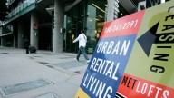 A sign advertises lofts for rent in a recently built residential building in downtown Los Angeles. October 2006. (AP Photo/Kevork Djansezian)