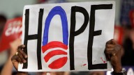Supporters hold up signs that read "Hope" as Democratic presidential hopeful Sen. Barack Obama D-Ill., speaks at a rally in Concord, N.H. January 2008 (AP Photo/M. Spencer Green)