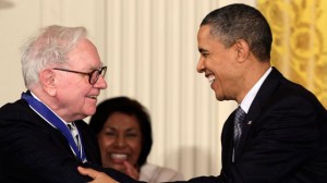President Barack Obama congratulates Warren Buffett after presenting him with a 2010 Presidential Medal of Freedom in an East Room ceremony at the White House. (AP Photo/Carolyn Kaster)