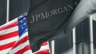 The corporate flag for JPMorgan Chase flies at corporate headquarters. May 2012. (AP Photo/Mark Lennihan)