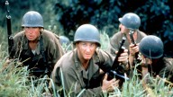 still picture from the movie "The Thin Red Line" directed by Terrence Malick that includes four soldiers with rifles in hand. (AP Photo/HO Filmfest)