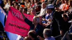 Protesters yell as Republican vice presidential nominee, Rep. Paul Ryan addresses the Republican National Convention in Tampa, Fla., on Wednesday, Aug. 29, 2012. (AP Photo/Jae C. Hong)