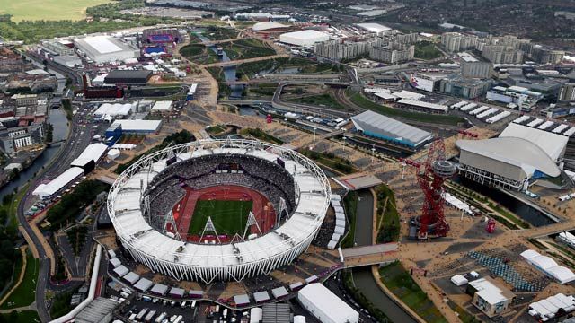 This aerial photo shows the Olympic Stadium and the Orbit during the 2012 Summer Olympics at Olympic Park in London. August 2012. (AP Photo/Jeff J Mitchell, Pool)