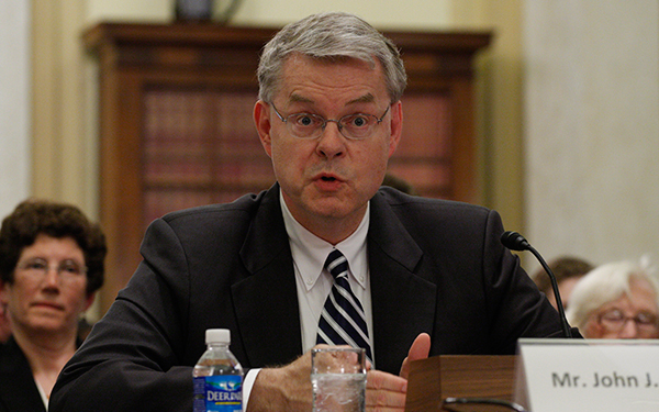 John Sullivan, nominated to the Federal Election Commission by President Obama, testifies in Washington at his Senate confirmation hearing. June 2009. (AP Photo/Harry Hamburg)