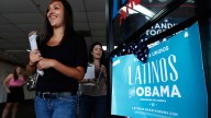 Volunteers for President Barack Obama's reelection campaign Carissa Valdez and Vanessa Trujillo as they leave campaign headquarters to register new voters in a heavily Latino neighborhood shopping plaza in Phoenix. June 2012. (AP Photo/Ross D. Franklin)