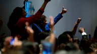 Supporters cheer as first lady Michelle Obama speaks at the Hispanic caucus at the Democratic National Convention in Charlotte, N.C. September 2012. (AP Photo/David Goldman)