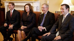Senate Minority Leader Mitch McConnell of Ky., second from right, meets with newly elected GOP Senators, Tuesday, Nov. 13, 2012, on Capitol Hill in Washington. From left are, Sen-elect Jeff Flake, R-Ariz., Sen-elect Deb Fischer, R-Neb, McConnell, and Sen-elect Ted Cruz, R-Texas. (AP Photo/Pablo Martinez Monsivais)