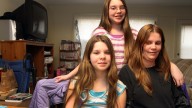 Chrissy Fairbanks poses with her daughters Angela, 11, and Alexus, 12, at their home, in Keene, N.H. Legally blind since she was 9, Chrissy Fairbanks just got word she's losing the $363 state welfare check she gets each month from the state because New Hampshire is counting Supplemental Security Income for the disabled in calculating their welfare grant. February 2012. (AP Photo/Jim Cole)