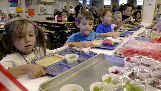 Students line up to be served lunch at the Thatcher Brook Elementary School in Waterbury, Vt. (AP Photo/Toby Talbot)