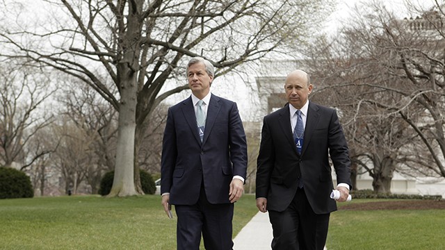 JP Morgan Chase & Co. Chief Executive Officer Jamie Dimon and Goldman Sachs Chief Executive Officer Lloyd Blankfein leave the White House in Washington following a meeting between chief executives and President Barack Obama. March 2009. (AP Photo/Evan Vucci)