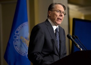 FILE - In this Friday, Dec. 21, 2012 file photo, The National Rifle Association executive vice president Wayne LaPierre, speaks during a news conference in response to the Connecticut school shooting in Washington. The nation's largest gun-rights lobby is calling for armed police officers to be posted in every American school to stop the next killer "waiting in the wings." (AP Photo/Evan Vucci)
