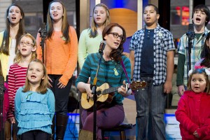 Ingrid Michaelson accompanied by children from Newtown, Conn. and Sandy Hook Elementary school perform "Somewhere Over the Rainbow" on ABC's "Good Morning America" on Tuesday, Jan. 15, 2013 in New York. (Photo by Charles Sykes/Invision/AP)