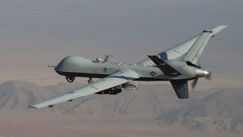 This undated handout photo provided by the U.S. Air Force shows a MQ-9 Reaper, armed with GBU-12 Paveway II laser guided munitions and AGM-114 Hellfire missiles, piloted by Col. Lex Turner during a combat mission over southern Afghanistan. (AP Photo/Lt. Col.. Leslie Pratt, US Air Force)