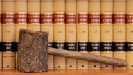 A gavel replica and law books are shown in the office of California Supreme Court Chief Justice Ronald George at his office in San Francisco, Wednesday, July 14, 2010. (AP Photo/Jeff Chiu)