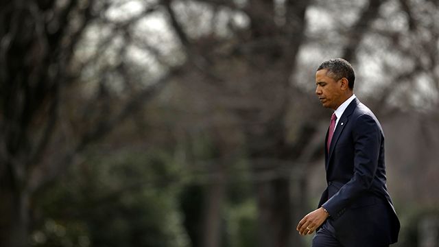 President Barack Obama walks across the South Lawn of the White House in Washington, Tuesday, March 5, 2013, before his departure on Marine One helicopter to Walter Reed National Military Medical Center and a visit with veterans who are being treated at the hospital and their families. (AP Photo/Pablo Martinez Monsivais)