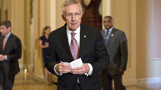 Senate Majority Leader Harry Reid, D-Nev., speaks with reporters following a Democratic strategy session at the Capitol in Washington, Tuesday, May 7, 2013. (AP Photo/J. Scott Applewhite)