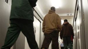 In this Feb. 1, 2012 file photo, inmates walk in a cell block at Coxsackie Correctional Facility in Coxsackie, N.Y. (AP Photo/Mike Groll, File)