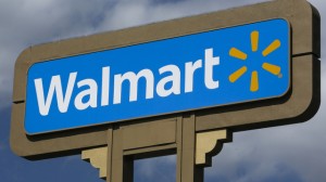 An outdoors sign for Walmart is seen in Duarte, California on May 28, 2013. (AP Photo/Damian Dovarganes)