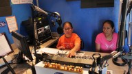 Two broadcasters at the Coalition of Immokalee Workers’ Radio Conciencia, a worker-run radio station in Immokalee, Florida.