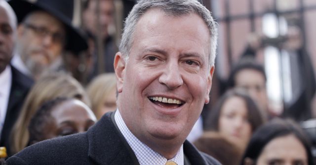 Democratic mayoral candidate Bill de Blasio, talks to the media after voting, Tuesday, Nov. 5, 2013 in the Park Slope neighborhood of the Brooklyn borough of New York. De Blasio is running against Republican candidate Joseph Lhota. (AP Photo/Mark Lennihan)