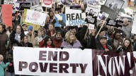 A few hundred marchers take part in a Martin Luther King Day march and rally to the Capitol in Olympia, Wash., Monday, Jan. 15, 2007. The march was part of a daylong educational summit organized by the Statewide Poverty Action Network. (AP Photo/John Froschauer)