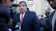 Governor Chris Christie talks to a reporter following a visit to Fort Lee Borough Hall Thursday, Jan. 9, 2014, in Fort Lee, NJ, to apologize to Fort Lee Mayor Mark Sokolich about the governor's staff allegedly closing lanes to the George Washington Bridge last September. (AP Photo/Kathy Willens)