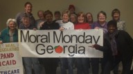 Banner of moral monday protesters in georgia