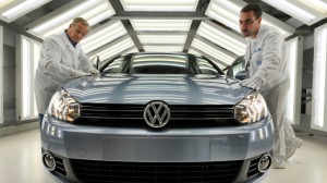 Workers check VW Golf cars at the assembly line of the Volkswagen plant in Zwickau, eastern Germany, Wednesday, Oct. 29, 2008. (Photo by Ekkehard Schulz/AP)