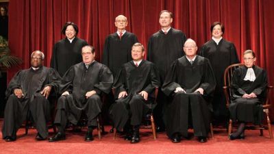 The justices of the Roberts Court pose for an official photograph, July 11, 2014. (Image: Ap Images/ The Supreme Court)