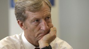 Businessman Tom Steyer listens during a meeting to announce the launch of a group called Virginians for Clean Government at Virginia Commonwealth University in Richmond, Va., Wednesday, Sept. 25, 2013. The group was formed to explain the impact of CONSOL Energy not paying royalties to their family and neighbors as well as speaking out against Ken Cuccinelli's acceptance of $111,000 in CONSOL contributions. (AP Photo/Steve Helber)