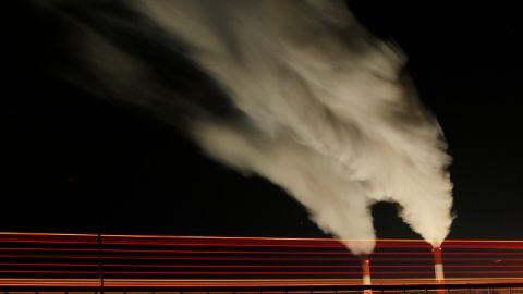 In this Jan. 19, 2012 file photo, smoke rises in this time exposure image from the stacks of the La Cygne Generating Station coal-fired power plant in La Cygne, Kan. (AP Photo/Charlie Riedel, Filr)