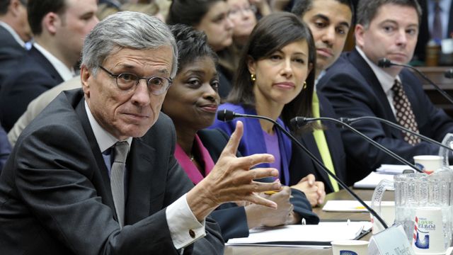 Federal Communications Commission Chairman Tom Wheeler, left, testifies on Capitol Hill in Washington, Thursday, Dec. 12, 2013, before the House Energy and Commerce Committee hearing on cell phones on planes. Wheeler is joined at the witness table with FCC Commissioners from second from left, Mignon Clyburn, Jessica Rosenworcel, Ajit Pai, and Michael O'Rielly. (AP Photo/Susan Walsh)