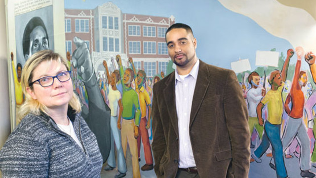 Kris McBride, Garfield's academic dean and testing coordinator, at left, and Jesse Hagopian, Garfield history teacher and a leader of the school's historic test boycott. (Photo by Betty Udesen.)