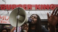Joshua Collins, 24, demonstrates outside the Burger King restaurant where he works during a protest calling for higher wages and a worker's union, Thursday, May 15, 2014, in Atlanta. AP Photo/David Goldman)