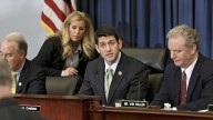 Paul Ryan, Chris Van Hollen, Tom Price, House Budget Committee Chairman Rep. Paul Ryan, R-Wis., center, presides over a markup session where House Republicans are crafting a budget-balancing plan that sharply cuts spending on transportation, health care programs for the middle class and the poor, food stamps and other domestic initiatives, Wednesday, April 2, 2014, on Capitol Hill in Washington. Ryan is flanked by Rep. Chris Van Hollen, D-Md., right, the committee's ranking member, and Rep. Tom Price, R-Ga., left. (AP Photo/J. Scott Applewhite)