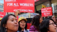 Fast food workers announce a global protest for a higher minimum wage outside a McDonald's restaurant in Manhattan on May 7, 2014. (BillMoyers.com/Neha Tara Mehta)