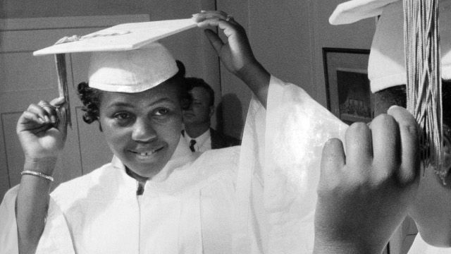Patricia Godbolt, first black student graduated from an integrated Norfolk, Va., high school, poses for a photo June 9, 1960, shortly before she received a diploma with honors from Norview High School. She was one of seven black students admitted to previously all white schools the previous year, under pressure of a Federal court order. (AP Photo/Neal V. Clark Jr.)