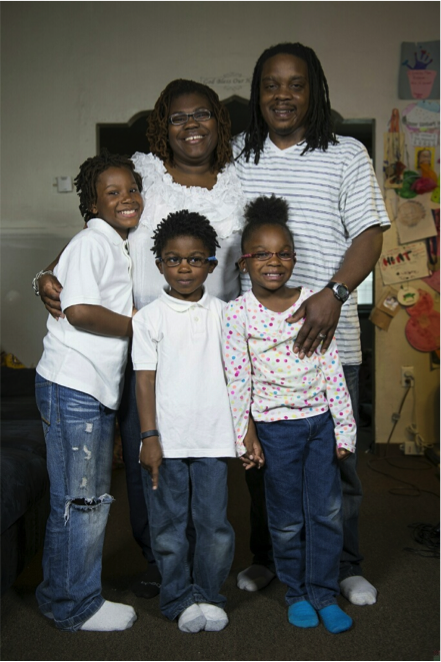 Tianna Gaines-Turner, center, and her family.
