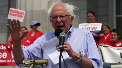 Senator Bernie Sanders, I-Vt., speaks to a crowd of several hundred people during a health care rally in front of the Statehouse in Montpelier, Vt., Saturday, May 1, 2010, where single-payer health care system supporters gathered believing that the federal bill didn't go far enough.(AP Photo/Alden Pellett)