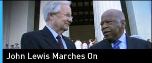 Bill Moyers and Rep. John Lewis standing on the steps of the Lincoln Memorial