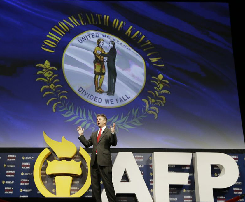 Kentucky Sen. Rand Paul speaks at the Americans for Prosperity gathering Friday, Aug. 29, 2014, in Dallas. Paul and Texas Gov. Rick Perry are bashing what they call the president's lack of leadership in response to the violent militant group attacking cities in Iraq. Both are among four top Republicans considering 2016 White House bids addressing the conservative summit in Dallas. (AP Photo/LM Otero)